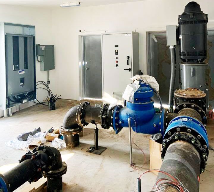 Industrial electrician services inside a manufacturing plant with Custom Electrical.