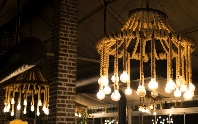 Hanging outdoor chandiler lamps, beautiful for any occasion - tips from Custom Electrical Services .