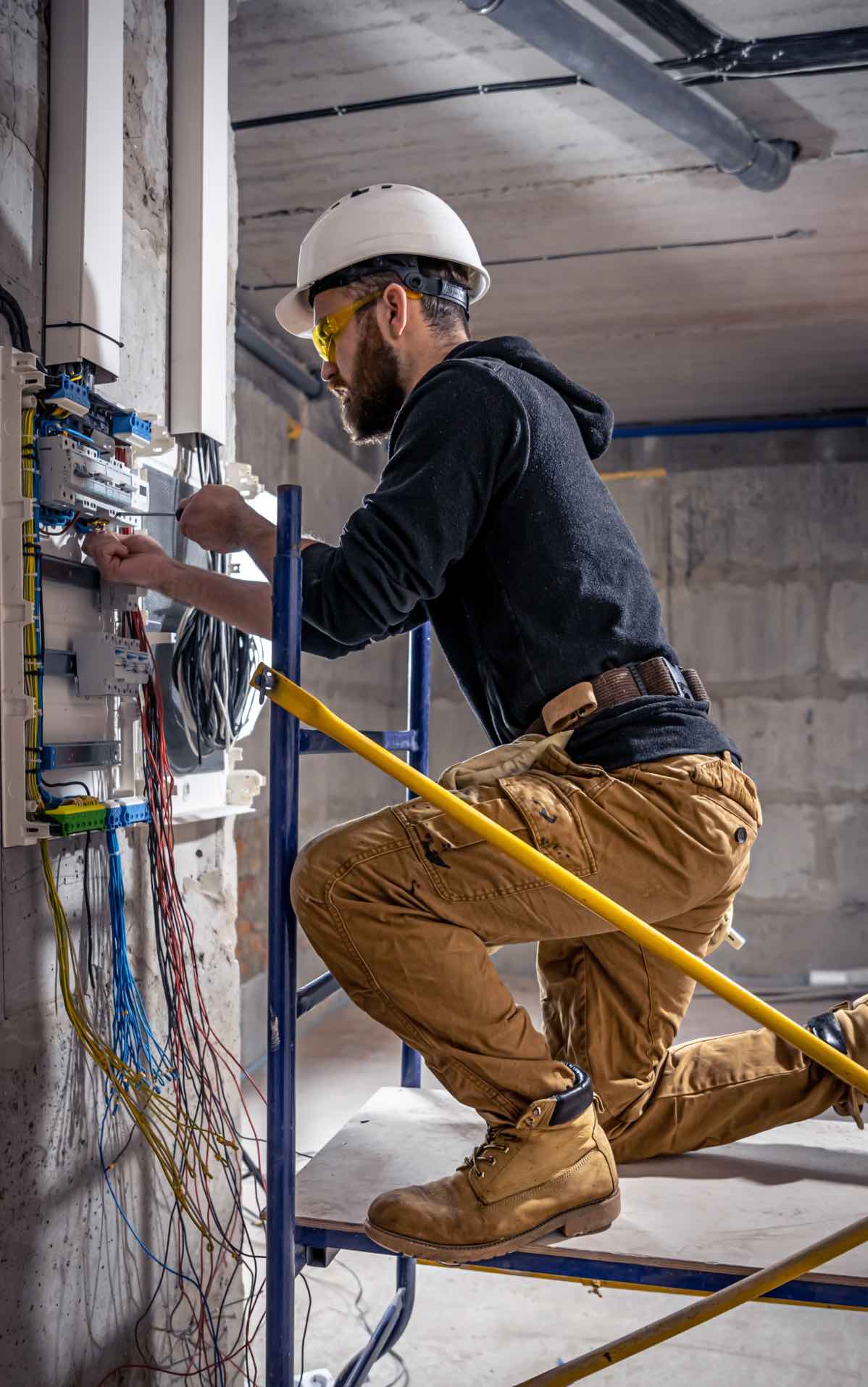 A Custom Electrical professional working on a commercial electrical project.