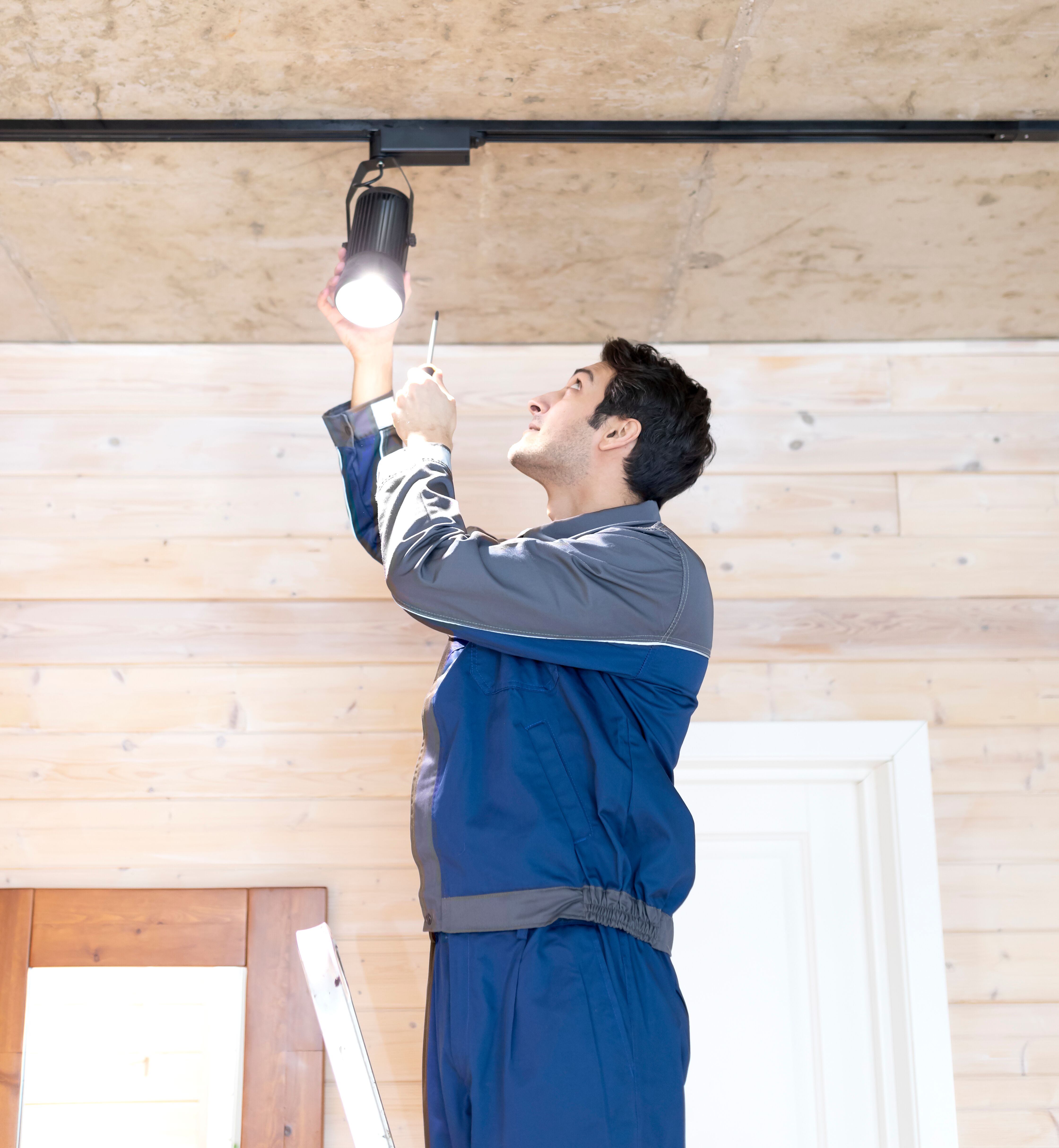 A Custom Electrical Services  home electrician in Utah handles a residential electrical project.