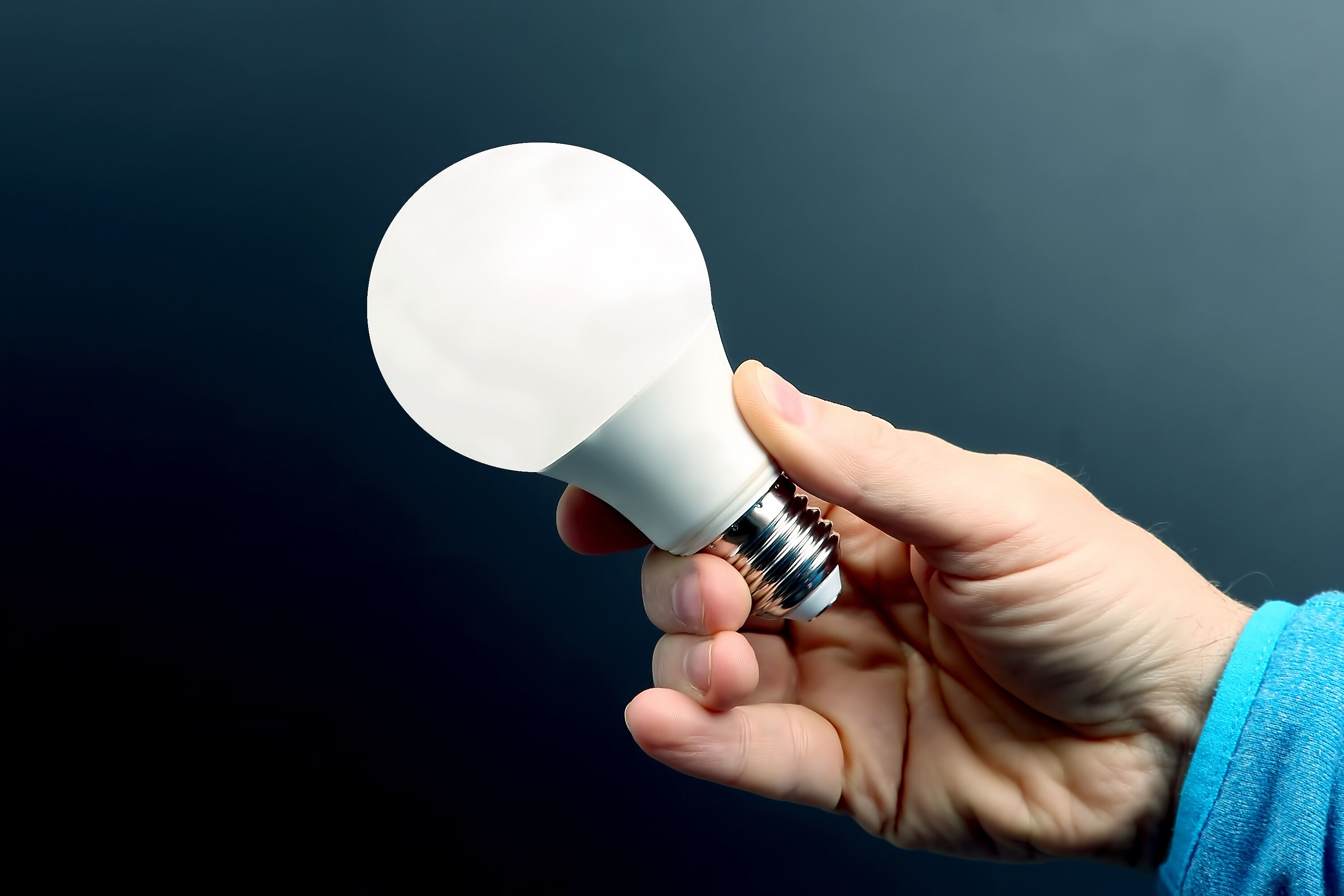 An LED lightbulb - if you're wondering 'do LED lights save energy', Custom Electrical Services  can help.